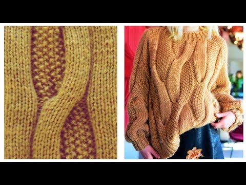 Вязаный спицами свитер косами