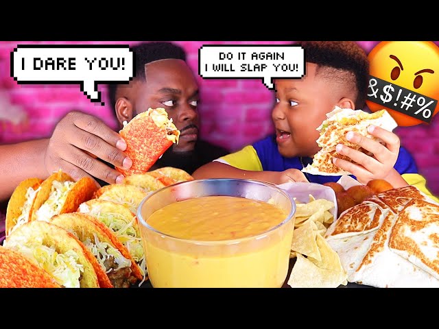 BOY HITS HIS DAD BECAUSE OF THIS! CHEESY TAKIS TACO MUKPRANK! (TACO BELL MUKBANG) | BEAST & JUJU class=