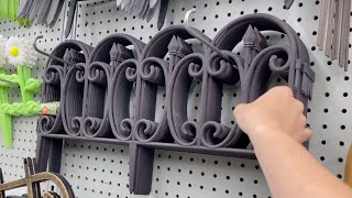 She hangs a Dollar Store fence from her ceiling…brilliant!