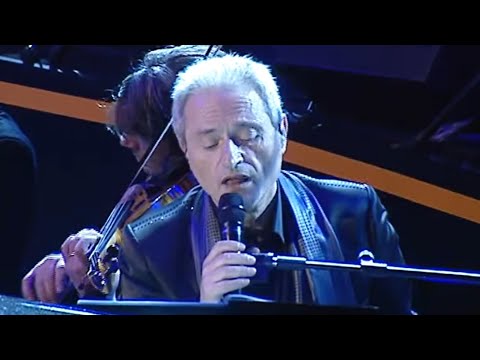 MP3 UN UOMO VENUTO DA MOLTO LONTANO MINGHI AMEDEO SCARICA