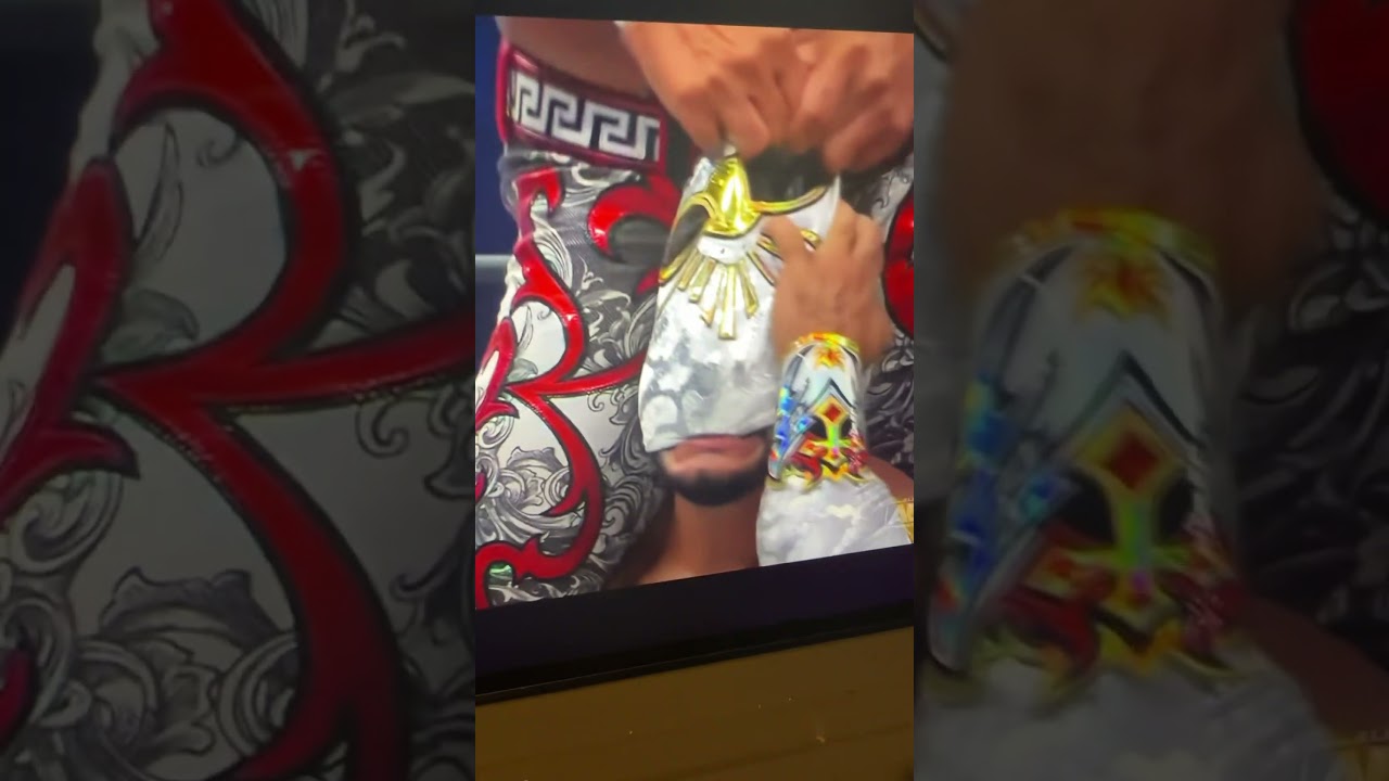 Guy rips Mystico’s mask 