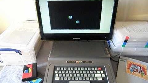 Color Robot Battle: Tau vs Omega on the TRS-80 Color Computer