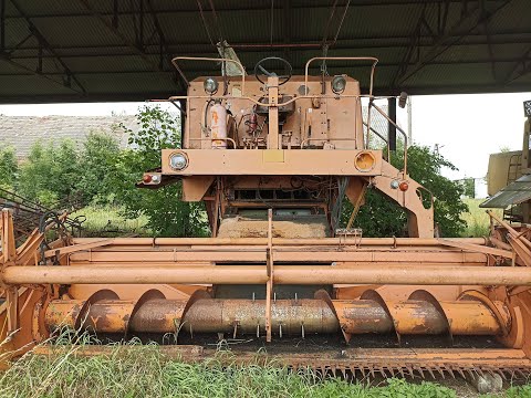 An abandoned state farm full of agricultural equipment