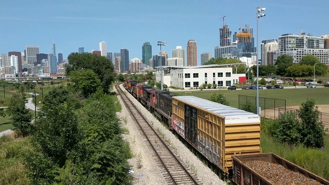 Train on St Charles Air Line Approaching Clark St Junction--Metra RI District Crossing