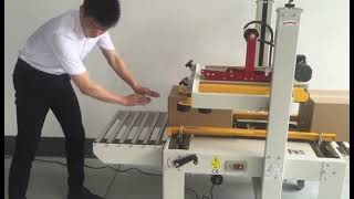 Semi Automatic Top and Bottom Belt Driven Carton Sealer | Firstpack Automation