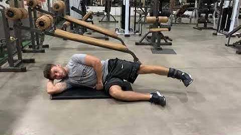 Abdução de quadril decúbito lateral no solo com caneleira