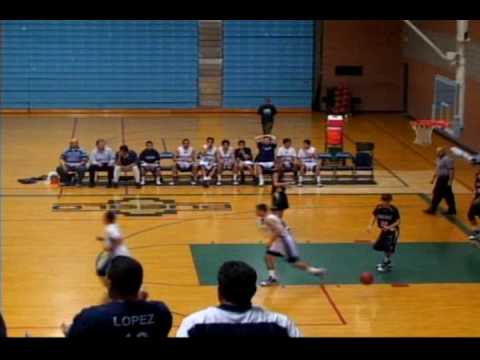 Pueblo's Michael Perez dunks on Flowing Wells