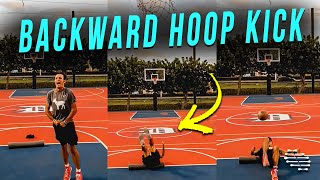 Guy Tosses the Ball Then Kick It Into Hoop While Lying on the Ground