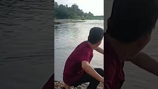 Playing Stone at the River