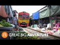 Download Watch a Train Run Through Thailand’s Most Dangerous Market Watch a Train Run Through Thailand’s Most Dangerous Market