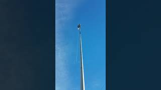 Climbing a flagpole with Todd Ross at Rocky Mountain Flag Company by Rocky Mountain Flag Company