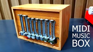 DIY MIDI music box using 8 CD stepper motors