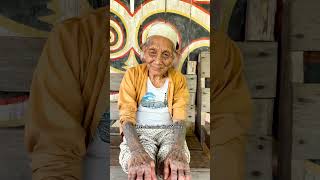 Journey to the Remote Village of the Tattooed Elders! 🛩️🏍️ #Shorts #Travel #Culture
