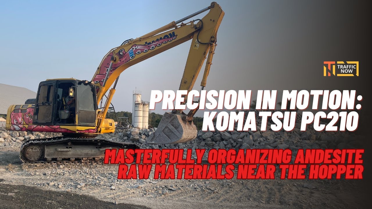 Precision in Motion: Komatsu PC210 Masterfully Organizing Andesite Raw Materials Near the Hopper