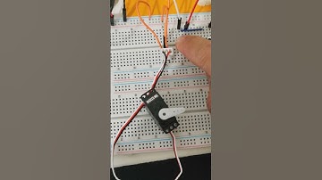 Two Push buttons to control reverse/forward rotation of Servo-motor on Arduino Board.