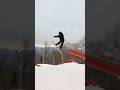 Kid does crazy stuff on snowboard.