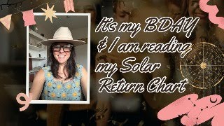 Me reading my Solar Return chart to get a glimpse at my year ahead