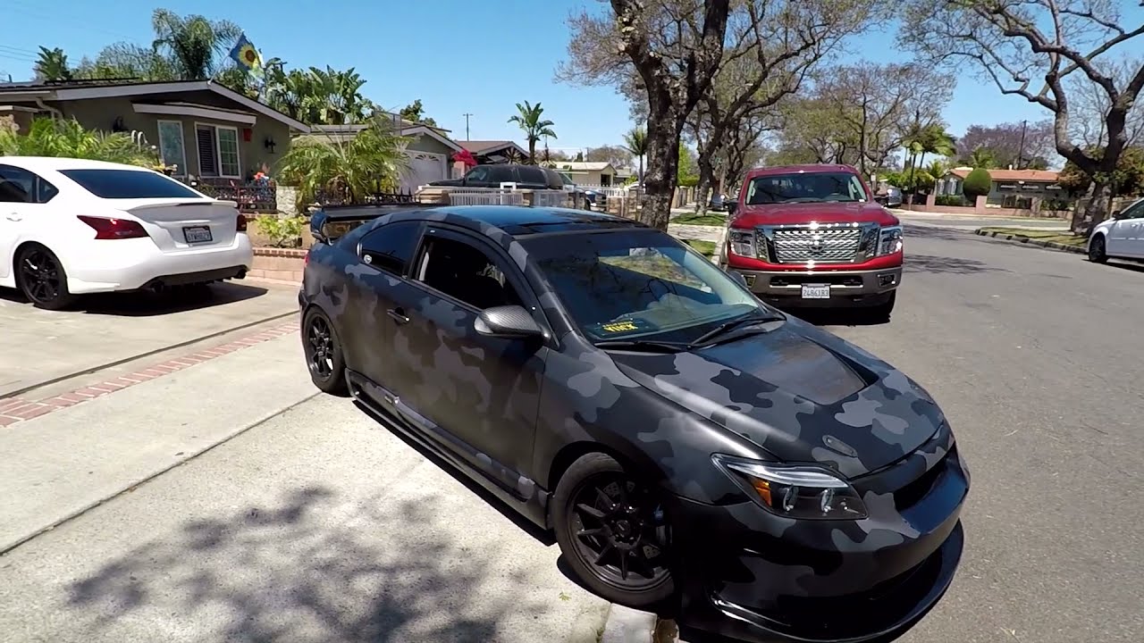 Wrapping a 1st gen Scion tC in a custom printed black and grey camo!
