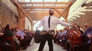 Flower man showers wedding guests with petals & tequila