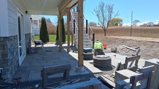 installing Hardscape patio Summer home on shore. #hardscape #patio #stonework #landscape