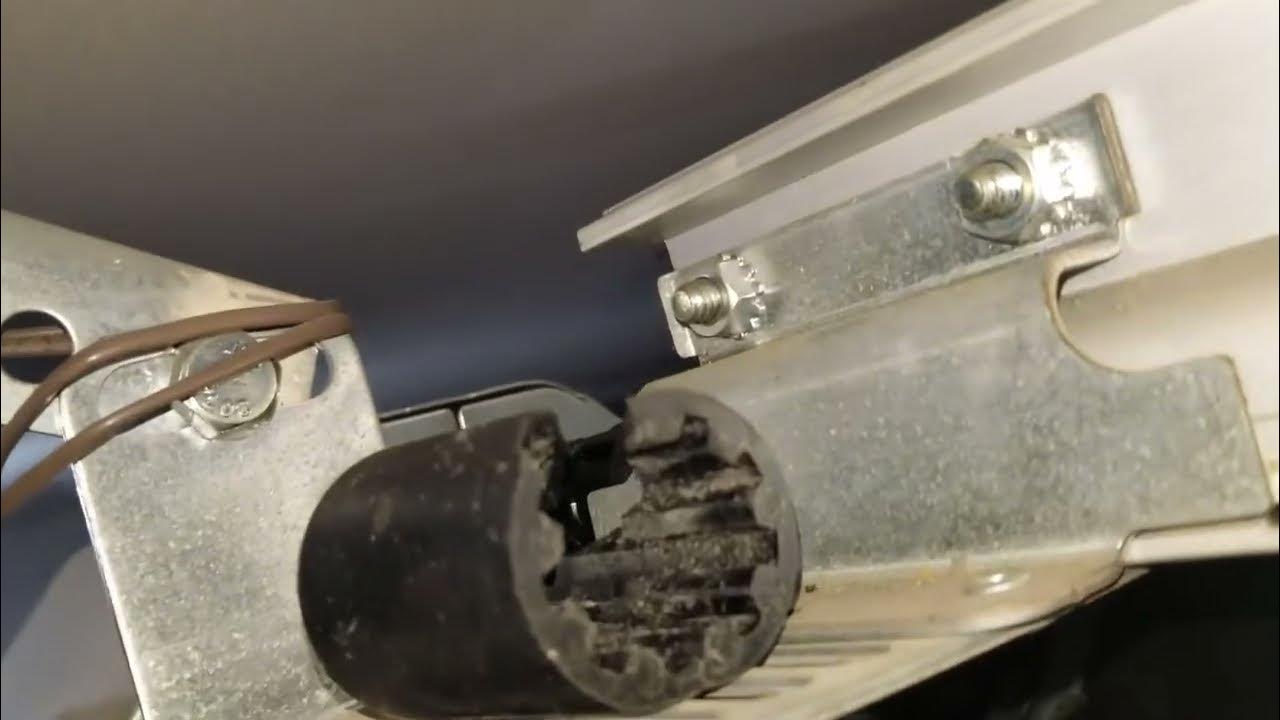 Liftmaster garage door grinding noise fix reinstall coupler and door