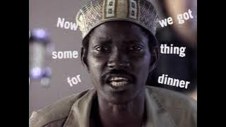 Talking Heads - [Nothing But] Flowers (Official Video)