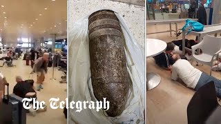 video: Unexploded bombshell packed in luggage as 'souvenir' sparks airport stampede