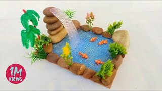 Making Fish in waterfall from hot glue gun and clay || Showpiece for home decoration.