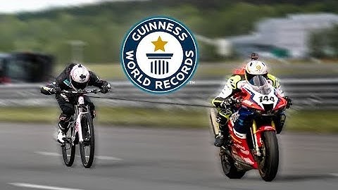 Fastest Towed Bicycle - Guinness World Records || world  record of bike versis cycle video