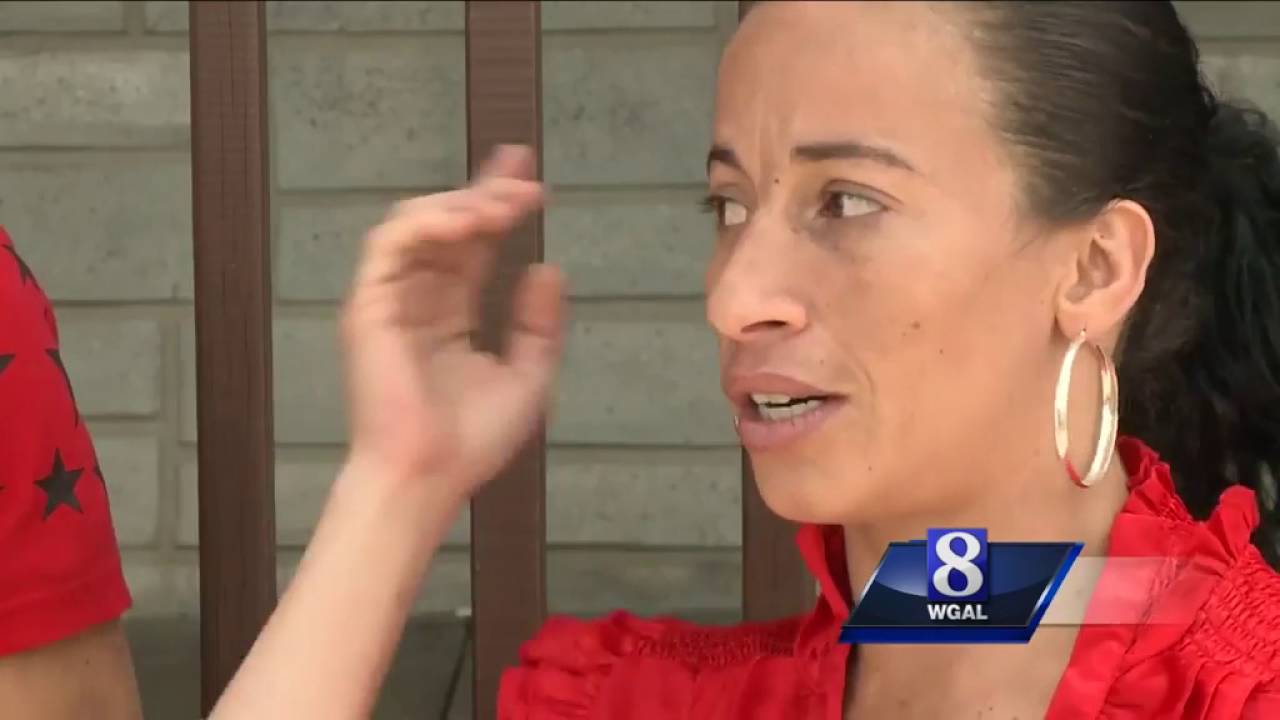 News 8 speaks with woman punched by cop - YouTube