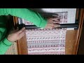 ロータリーカッターで帯の布を切る