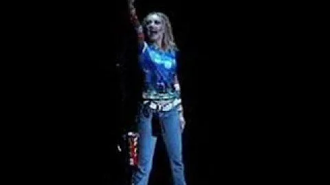 Courtney Corey as Maureen in Rent