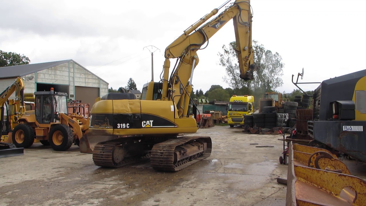 CAT 319 C - 2005 - 8360 - YouTube