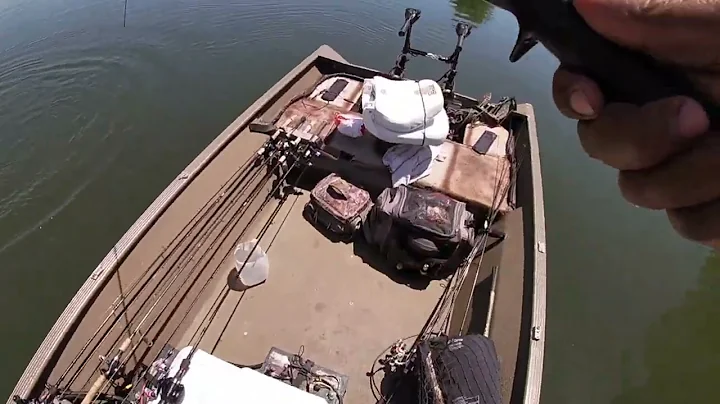 TIM GUTHRIE HUNTING BASS ON BED AT LAKE VARNER, GE...
