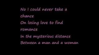 U2-A Man and a Woman (Lyrics)