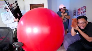 POPPING THE WORLD’S LARGEST BALLOON!!