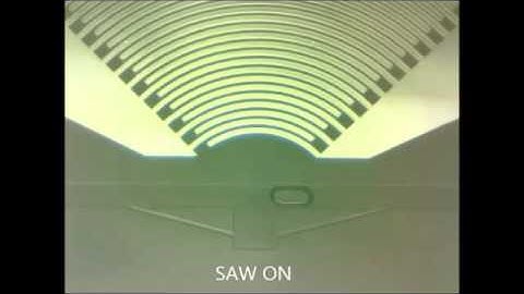 Microfluidic on-demand droplet merging using surface acoustic waves