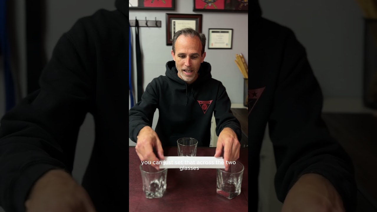 Balance a Glass on a Sheet of Paper 