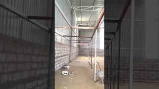 The tin shed has a sturdy structure with a strong platform at a height of 8 feet to store the stock