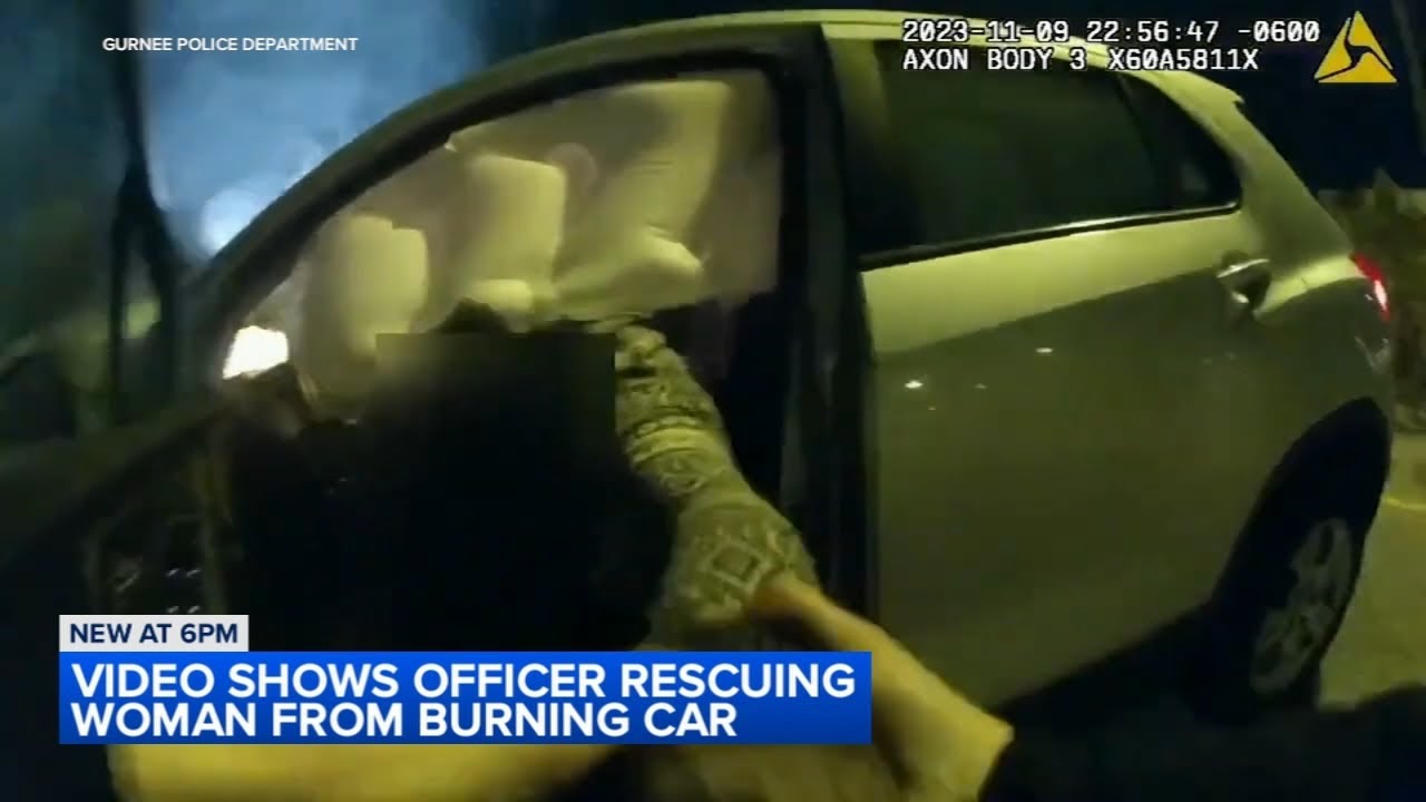 Police officer rescues woman from burning vehicle after crash into ...