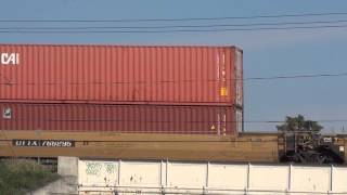 CSX Double Stack Train Roars By on Raised Tracks