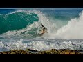 Surfing on agave wood surfboard