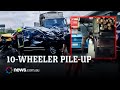 One dead and six injured as logging truck loses control