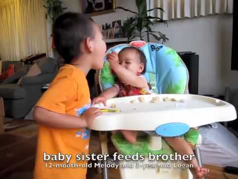 baby sister feeding big brother - YouTube
