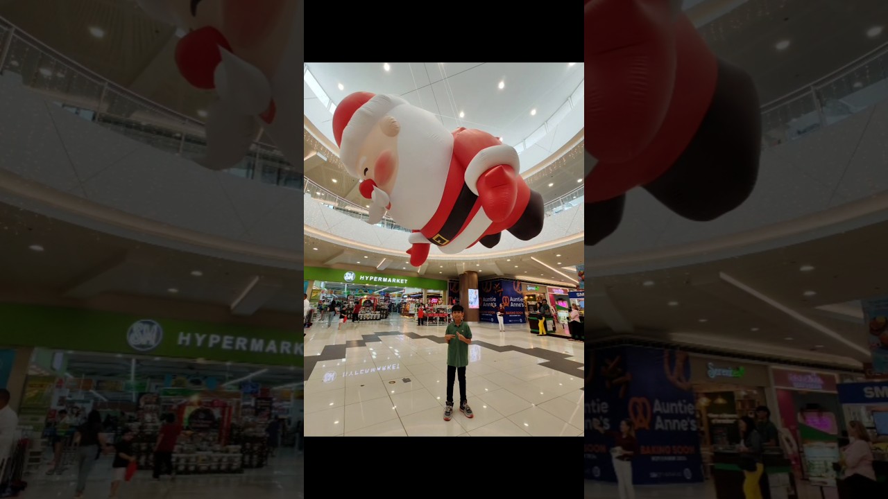 KYRIE WITH HUGE SANTA CLAUS AT SM MARILAO 