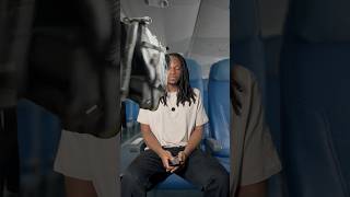 Sitting in the aisle seat