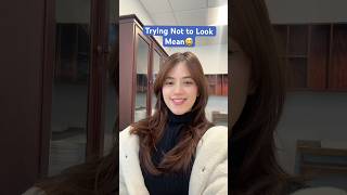 Trying Not To Look Mean.