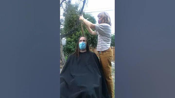 Stacey Whitmire cuts hair