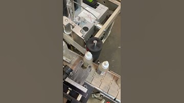 BID ON EQUIPMENT: Item 420743 - COMAS Automatic Piston Filler Capper With Wrap Labeler