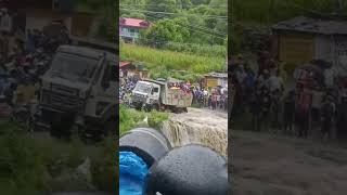 Truck Trapped in a Flooded River